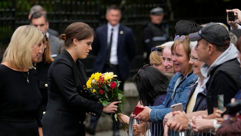 Princess Eugenie receives a bunch of flowers from a member of the public outside the gates of Balmoral Castle in Aberdeenshire, Scotland, Saturday, Sept. 10, 2022. Queen Elizabeth II, Britain&#39;s longest-reigning monarch and a rock of stability across much of a turbulent century, died Thursday after 70 years on the throne. She was 96. 
PIC:AP