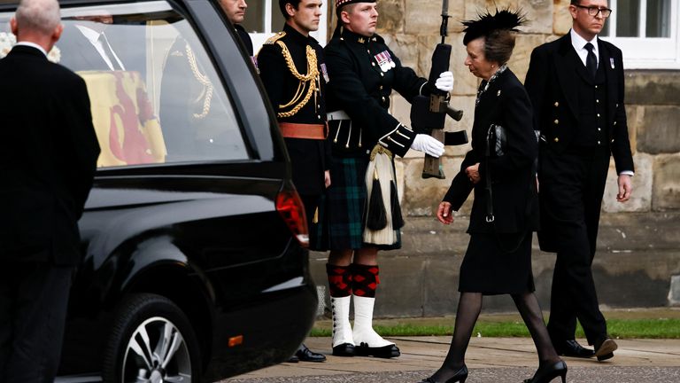 The Princess Royal approaches the hearse carrying the coffin of Queen Elizabeth II