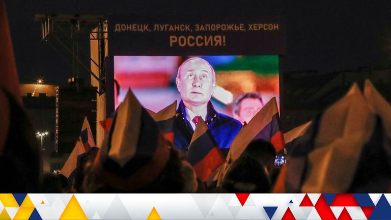 Russian President Vladimir Putin is seen on a screen during a concert marking the declared annexation of the Russian-controlled territories of four Ukraine&#39;s Donetsk, Luhansk, Kherson and Zaporizhzhia regions, after holding what Russian authorities called referendums in the occupied areas of Ukraine that were condemned by Kyiv and governments worldwide, near the Kremlin and Red Square in central Moscow, Russia, September 30, 2022. A slogan on the screen reads: "Donetsk, Luhansk, Zaporizhzhia, Kherson - Russia!" REUTERS/REUTERS PHOTOGRAPHER