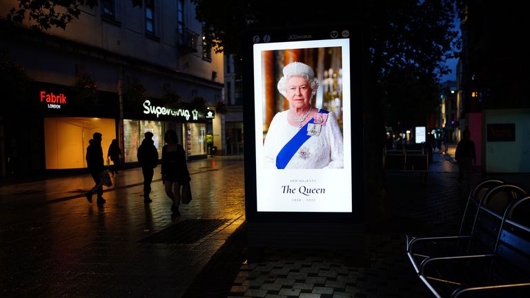 An advertising display board in Queen Street, Cardiff, displays a tribute to the monarch