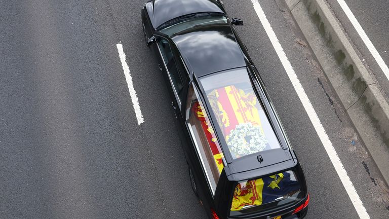The hearse carrying the coffin of Britain&#39;s Queen Elizabeth travels along the A90 road in Dundee, Scotland, Britain, September 11, 2022. REUTERS/Hannah McKay