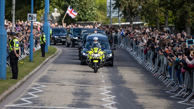 The hearse carrying the coffin of Queen Elizabeth II passing through Aberdeen as it continues its journey to Edinburgh from Balmoral