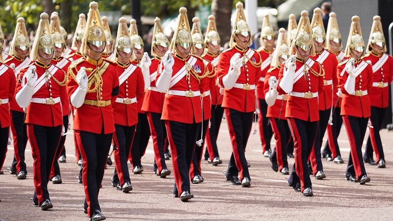 Members of the Household Cavalry escorting the coffin of Queen Elizabeth II, is carried on a horse-drawn gun carriage of the King&#39;s Troop Royal Horse Artillery,