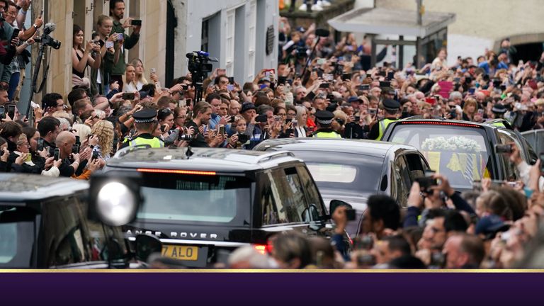 The hearse carrying the coffin of Queen Elizabeth II, draped with the Royal Standard of Scotland, passes along Canongate towards the Royal Mile as it completes its journey from Balmoral to the Palace of Holyroodhouse in Edinburgh