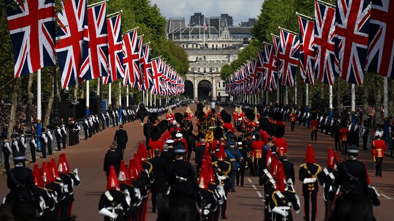The coffin of Queen Elizabeth II, dressed to the Royal Standard with the Royal Crown placed on top, is carried in a horse-drawn carriage of the King's Royal Horse Artillery, during a ceremonial procession from the Palace Buckingham Palace to Westminster Hall, London, where it will lie in state ahead of her funeral on Monday.  Date taken: Wednesday, September 14, 2022.