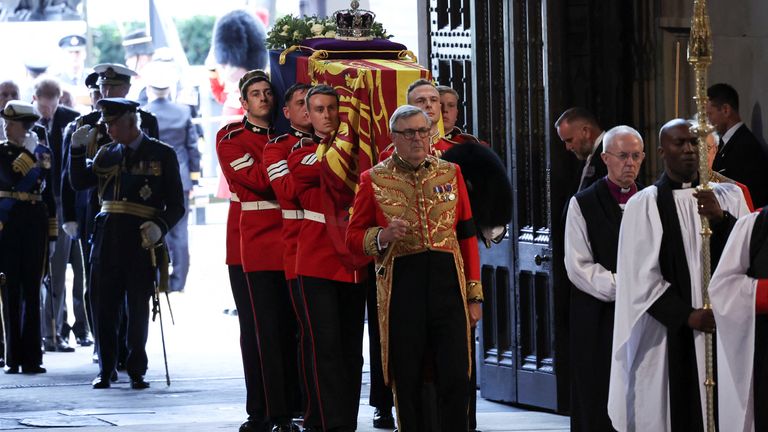 The bearer party carries the coffin of Queen Elizabeth II into Westminster Hall, London, where it will lie in state ahead of her funeral on Monday. Picture date: Wednesday September 14, 2022.