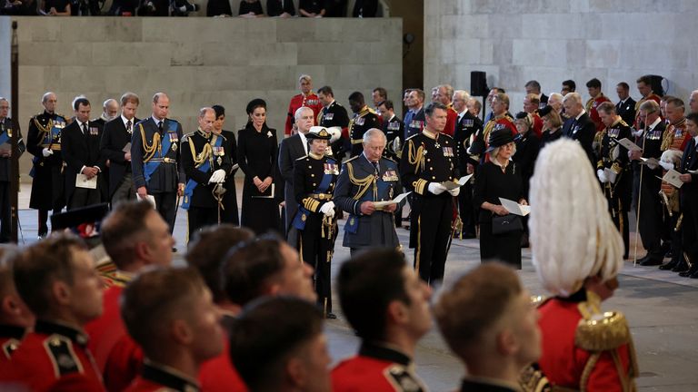 Britain&#39;s King Charles, Queen Camilla, Britain&#39;s Anne, Princess Royal, William, Prince of Wales, Catherine, Princess of Wales, Prince Andrew, Prince Edward, Prince Harry and Meghan, Duchess of Sussex react as the coffin of Britain&#39;s Queen Elizabeth arrives at Westminster Hall from Buckingham Palace for her lying in state, in London, Britain, September 14, 2022. REUTERS/Alkis Konstantinidis/Pool