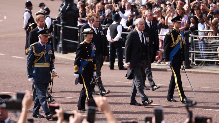 Britain&#39;s King Charles, Princess Anne, Prince Andrew and Prince Edward march during the procession of the coffin of Britain&#39;s Queen Elizabeth from Buckingham Palace to the Houses of Parliament for her lying in state, in London, Britain, September 14, 2022. REUTERS/Tom Nicholson