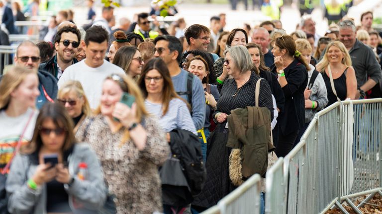 Members of the public at the end of the queue in Southwark Park, south London, as they wait to view Queen Elizabeth II lying in state. Picture date: Sunday September 18, 2022.