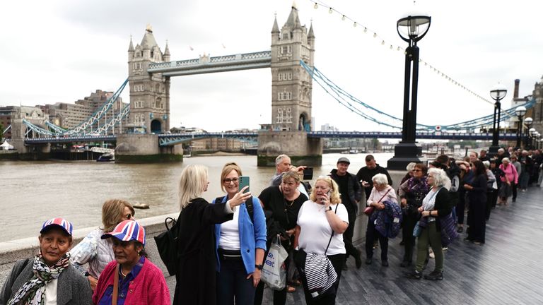 Members of the public in the queue on the South Bank near to Tower Bridge, London, as they wait to view Queen Elizabeth II lying in state ahead of her funeral on Monday. Picture date: Thursday September 15, 2022.