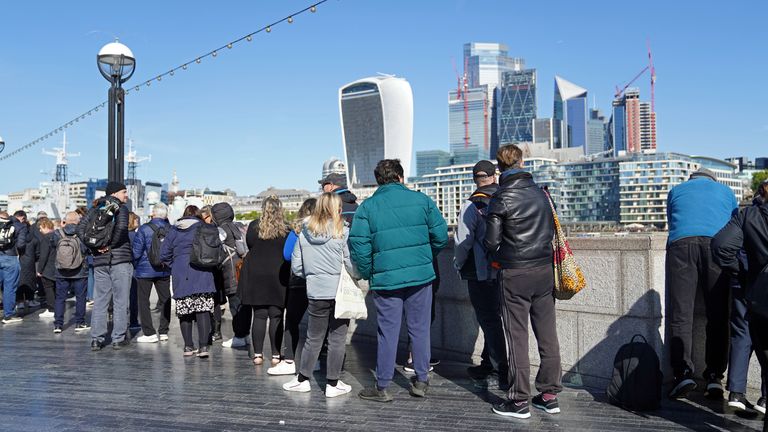Members of the public line up near Tower Bridge in London, as they wait to see Queen Elizabeth II lie in state ahead of her funeral on Monday.  Date taken: Saturday, September 17, 2022.