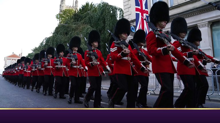 Members of the Grenadier Guards march down the High Street in Windsor following an early morning rehearsal for the funeral of Queen Elizabeth II, ahead of her funeral on Monday. Picture date: Saturday September 17, 2022.