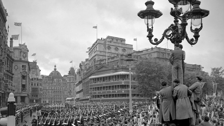 File photo dated 2/6/1953 of crowds in Trafalgar Square in the rain watch as troops march past on the return from Westminster Abbey after the Queen&#39;s coronation. The Queen&#39;s coronation, rich in religious significance, was a morale boost for a nation starved of pageantry by the war, and for a day street parties banished the hardship of rationing and shortages and even atrocious, unseasonal weather did not dampen the enthusiasm. Issue date: Thursday September 8, 2022.