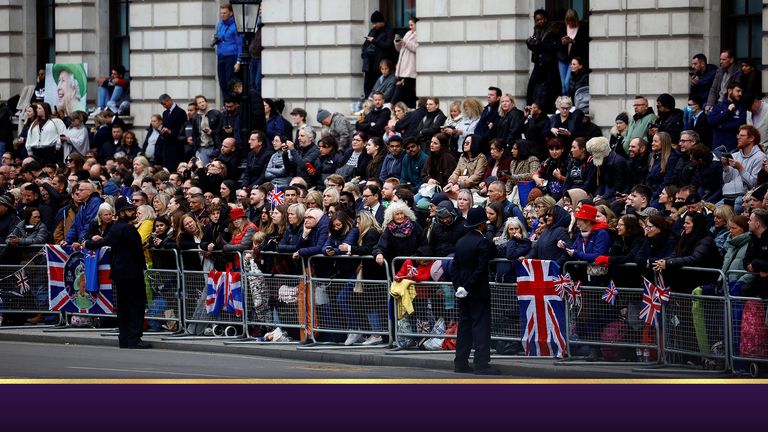 People gather to watch the state funeral and burial of Britain&#39;s Queen Elizabeth, at Parliament Square in London, Britain, September 19, 2022.   REUTERS/Sarah Meyssonnier/Pool