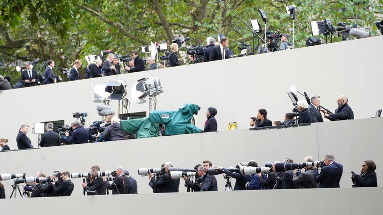 Members of the media outside Westminster Abbey on the day of the State Funeral of Queen Elizabeth II in London. Picture date: Monday September 19, 2022. James Manning/Pool via REUTERS