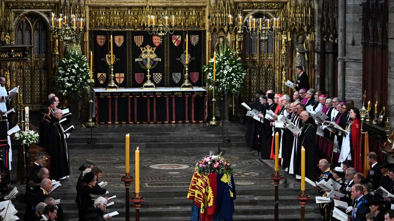 The Queen&#39;s coffin inside Westminster Abbey during the funeral service