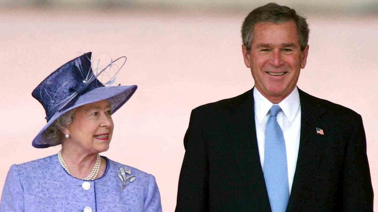 FILE PHOTO: U.S. President George W. Bush stands with Britain's Queen Elizabeth II at the official welcoming ceremony at Buckingham Palace in London, Britain, November 19, 2003. Ian Jones/Pool via REUTERS/File Photo