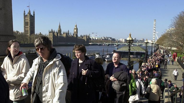 The public queue by Lambeth Bridge on their way to Westminster Hall  to pay their respects to the Queen Mother, who lies in state at the Hall before her funeral.
2002-04-07
