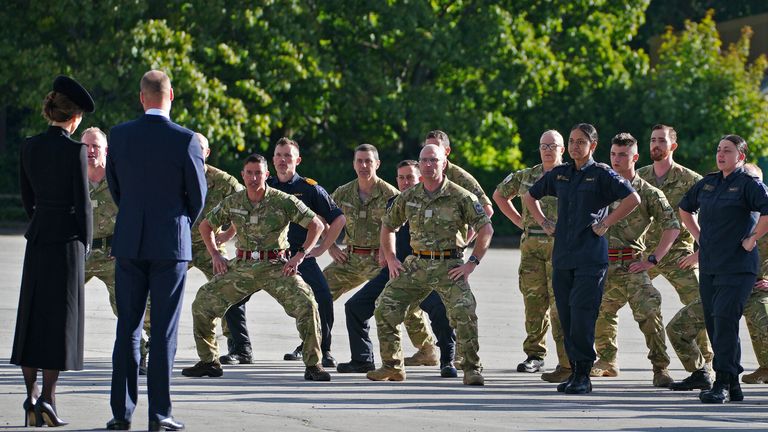 The Prince and Princess of Wales watch New Zealand troops performing the haka during a visit to the Army Training Centre (ATC) Pirbright in Guildford, Surrey, to meet troops from the Commonwealth who have been deployed to the UK to take part in the funeral of Queen Elizabeth II. Soldiers from Canada, Australia and New Zealand have gathered at Pirbright to rehearse their roles in the funeral on Monday. Picture date: Friday September 16, 2022.
