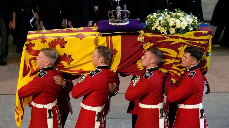 The bearer party carries the coffin of Queen Elizabeth II into Westminster Hall, London, where it will lie in state ahead of her funeral on Monday. Picture date: Wednesday September 14, 2022.