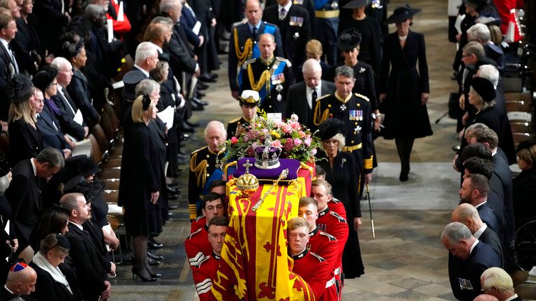 King Charles III, Camilla, the Queen Consort and members of the Royal Family follow the coffin of Queen Elizabeth II as it is carried out of Westminster Abbey. Pic: AP