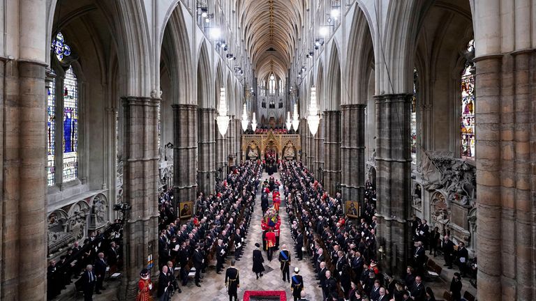 King Charles III and members of the royal family walk behind the coffin of Queen Elizabeth II, dressed in Royal Standard with the Crown of the Royal State, the sphere and the scepter of the Sovereign, as it is carried into Westminster Abbey for the State Funeral.  Date taken: Monday, September 19, 2022. Danny Lawson / Pool via REUTERS