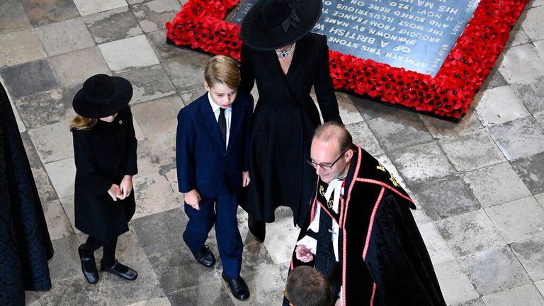 Kate, Princess of Wales, Princess Charlotte, and Prince George of Wales arrive for the State Funeral of Queen Elizabeth II at Westminster Abbey, in London, Monday Sept. 19, 2022. The Queen, who died aged 96 on Sept. 8, will be buried at Windsor alongside her late husband, Prince Philip, who died last year.  (Gareth Cattermole/Pool Photo via AP)