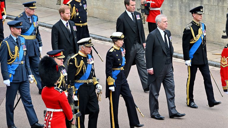 WINDSOR, ENGLAND - SEPTEMBER 19: King Charles III, Princess Anne, Princess Royal, Prince Andrew, Duke of York, Prince Edward, Earl of Wessex, (2nd row from L) Prince William, Prince of Wales, Prince Harry, Duke of Sussex, Peter Phillips, (3rd row from L) and Prince Richard, Duke of Gloucester join the Procession following State Hearse carrying the coffin of Queen Elizabeth II towards St George&#39;s Chapel on September 19, 2022 in Windsor, England. 