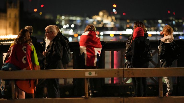 A woman in the queue near Westminster Palace to pay their respect to the late Queen Elizabeth II during the Lying-in State, at Westminster Hall in London. Pic: AP