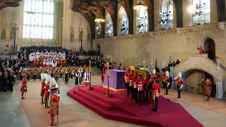The coffin of Queen Elizabeth arrives at Westminster Hall in London, Wednesday, Sept. 14, 2022. The Queen will lie in state in Westminster Hall for four full days before her funeral on Monday Sept. 19. (AP Photo/Gregorio Borgia, Pool)