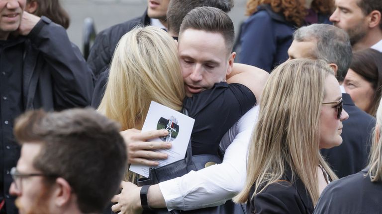 Mourners at the funeral of Rab Wardell