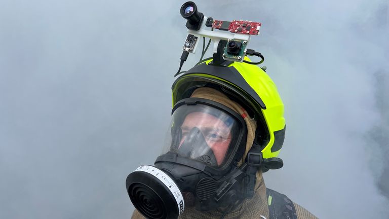 Scottish Fire and Rescue Service firefighter wearing an experimental AI-enabled smart helmet