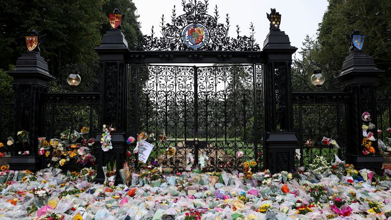 Flowers are pictured at the gate, following the passing of Britain&#39;s Queen Elizabeth, at the Sandringham Estate in eastern England, Britain, September 11, 2022. REUTERS/David Klein
