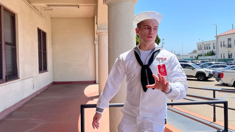 US Navy sailor Ryan Sawyer Mays walks past reporters at Naval Base San Diego before entering the Navy courtroom Wednesday, Aug. 17, 2022. Photo: AP