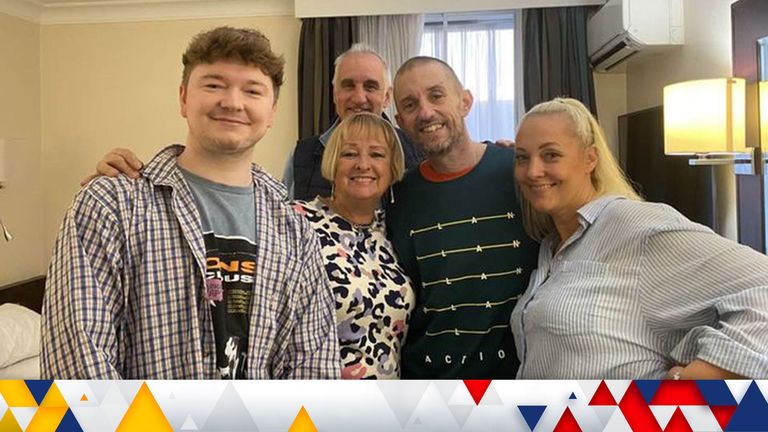Shaun Pinner pictured in a hotel with his family