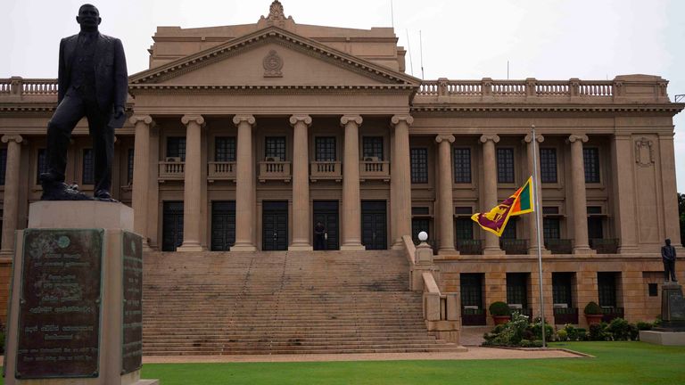 The Sri Lankan national flag flutters half-mast. Pic: AP