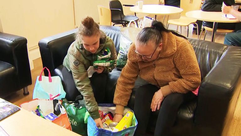 Zoe, a mother of seven, collects food at a food bank in Derby