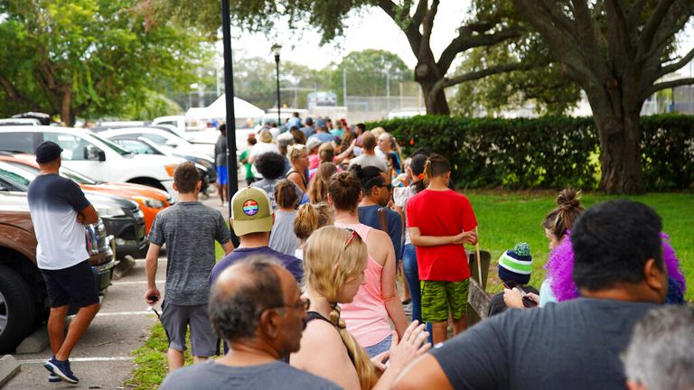 Residents in Tampa, Florida, queue for two hours to fill sandbags on Sunday, 25 September Pic: Tampa Bay Times via AP 