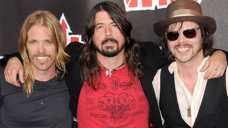 (LR) Taylor Hawkins and Dave Grohl of Foo Fighters, and Gaz Coombes of Supergrass, pictured in 2008. Photo: Startraks/Shutterstock