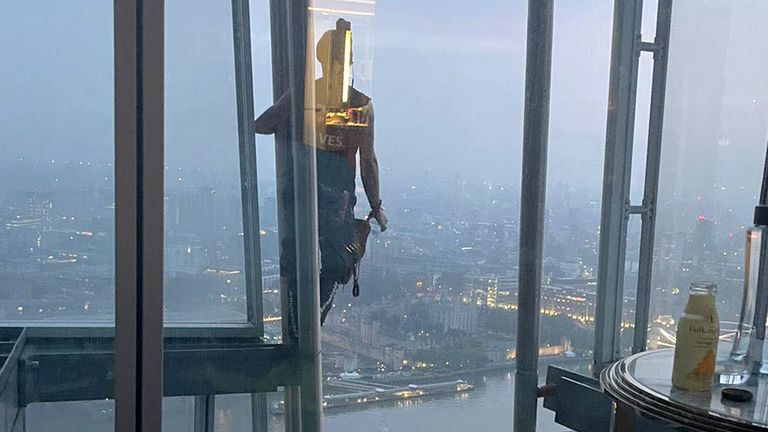 The man pictured outside the couple&#39;s hotel window on the 40th floor. 