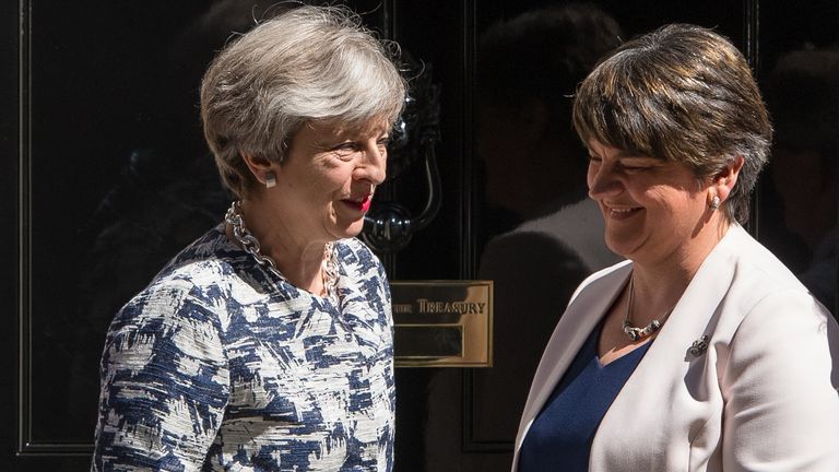 Theresa May greets DUP leader Arlene Foster at Downing Street in 2017