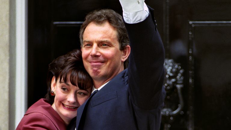 Tony and Cherie Blair embracing in front of 10 Downing Street after he was elected prime minister