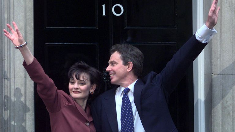 New Prime Minister Tony Blair waves with his wife Cherie on the doorstep of Number 10 Downing Street after winning a landslide election victory May 2. This was the first time in 18 years that the Labour Party has been in power. BRITAIN ELECTION