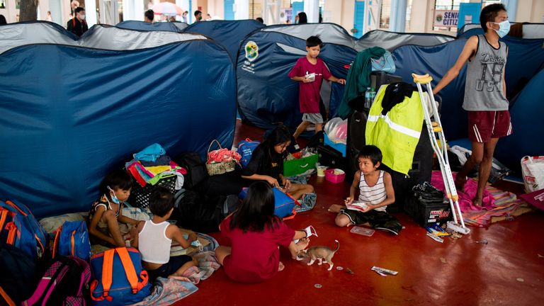 Children take shelter at an evacuation centre in Marikina City, Metro Manila, Philippines