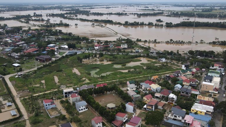 Flooded San Miguel town, Bulacan province, Philippines. Pic AP