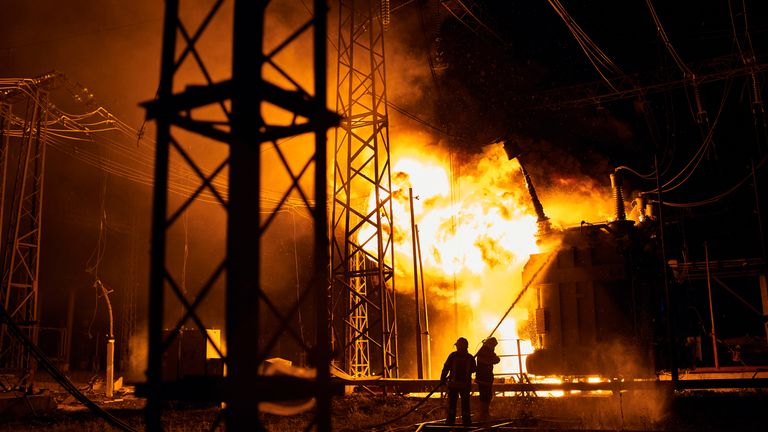 Firefighters from the Ukrainian State Emergency Service put out the blaze after a Russian rocket attack hit a power plant in Kharkiv, Ukraine on Sunday, September 11, 2022. Kharkiv and Donetsk regions were completely disconnected during the rocket attack.  (AP Photo/Kostiantyn Liberov)