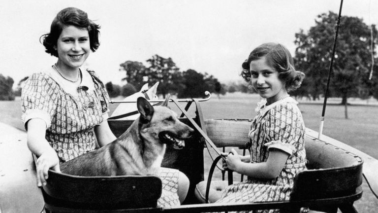 Princess Elizabeth and Princess Margaret in the garden of their wartime country residence (Windsor) where they are staying. Their greatest pleasure is the occasional visits of the King and Queen. In view of the petrol shortage their Royal Highnesses ponycart has again been brought into use.