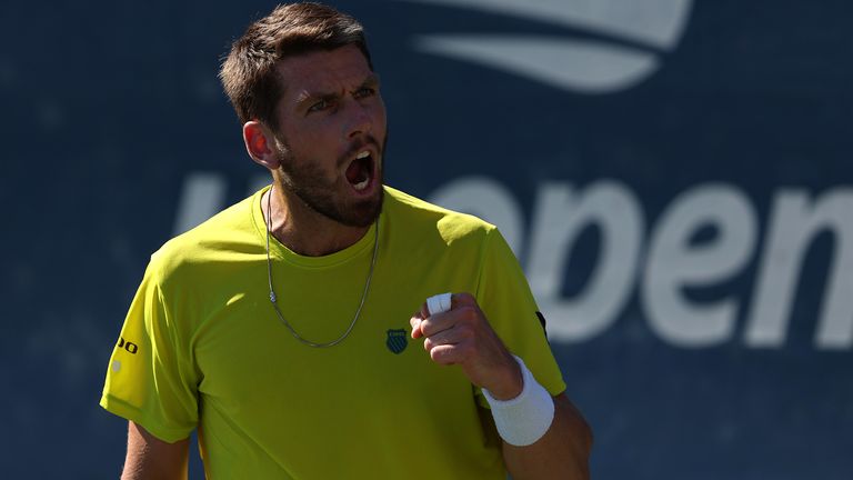 Cameron Norrie of Great Britain celebrates against Joao Sousa of Portugal during their Men&#39;s Singles Second Round match on Day Four of the 2022 US Open at USTA Billie Jean King National Tennis Center on September 01, 2022 in the Flushing neighborhood of the Queens borough of New York City. (Photo by Julian Finney/Getty Images)