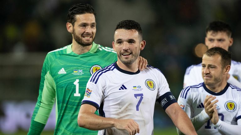 John McGinn and Craig Gordon celebrate Scotland promotion to Nations League Group A