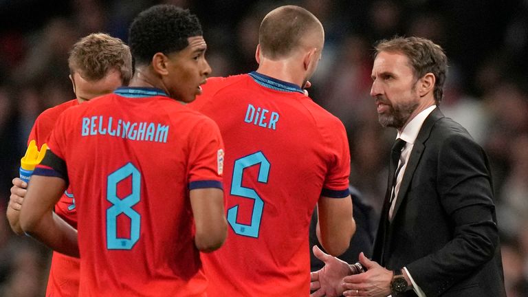 Gareth Southgate talks with players during the first half of England vs Germany